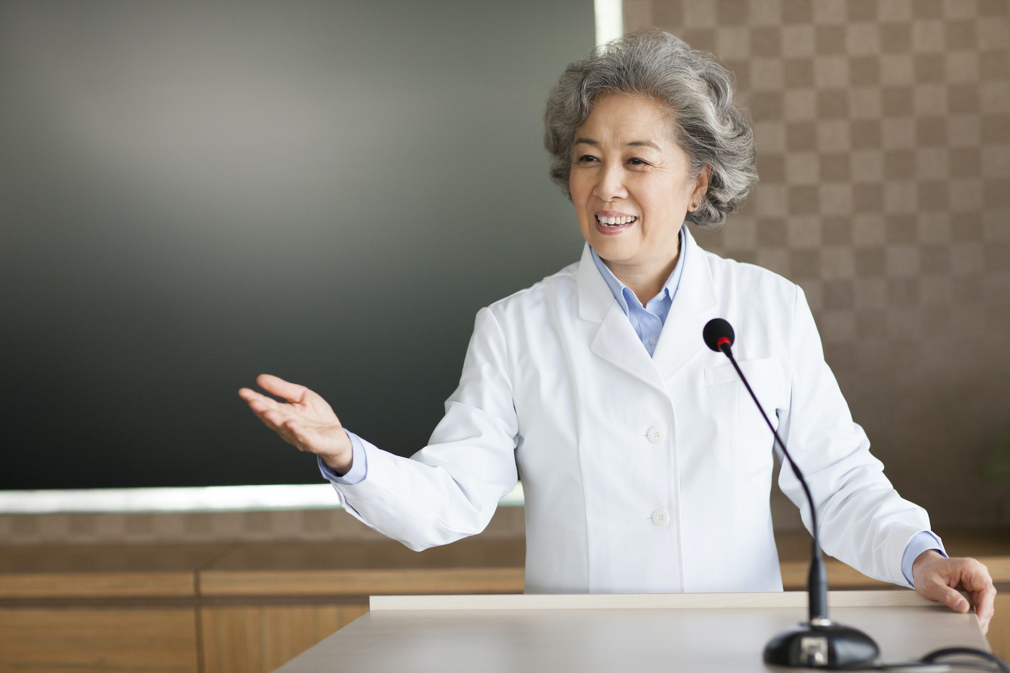 Senior female doctor giving a speech